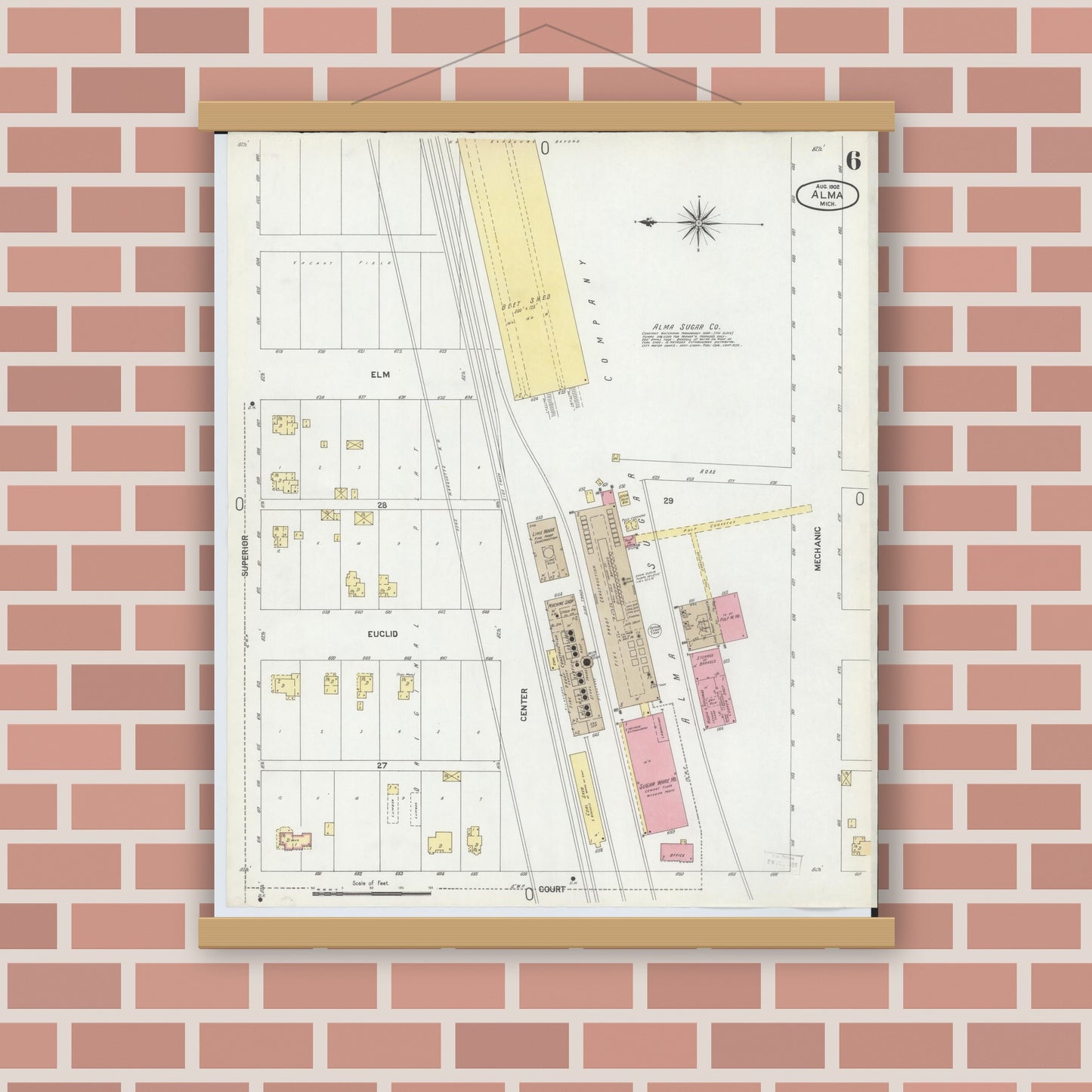 Old map wall art mockup — magnetic wood frame on brick wall — Sanborn Fire Insurance Map from Alma, Gratiot County, Michigan (1902), Sheet #0006