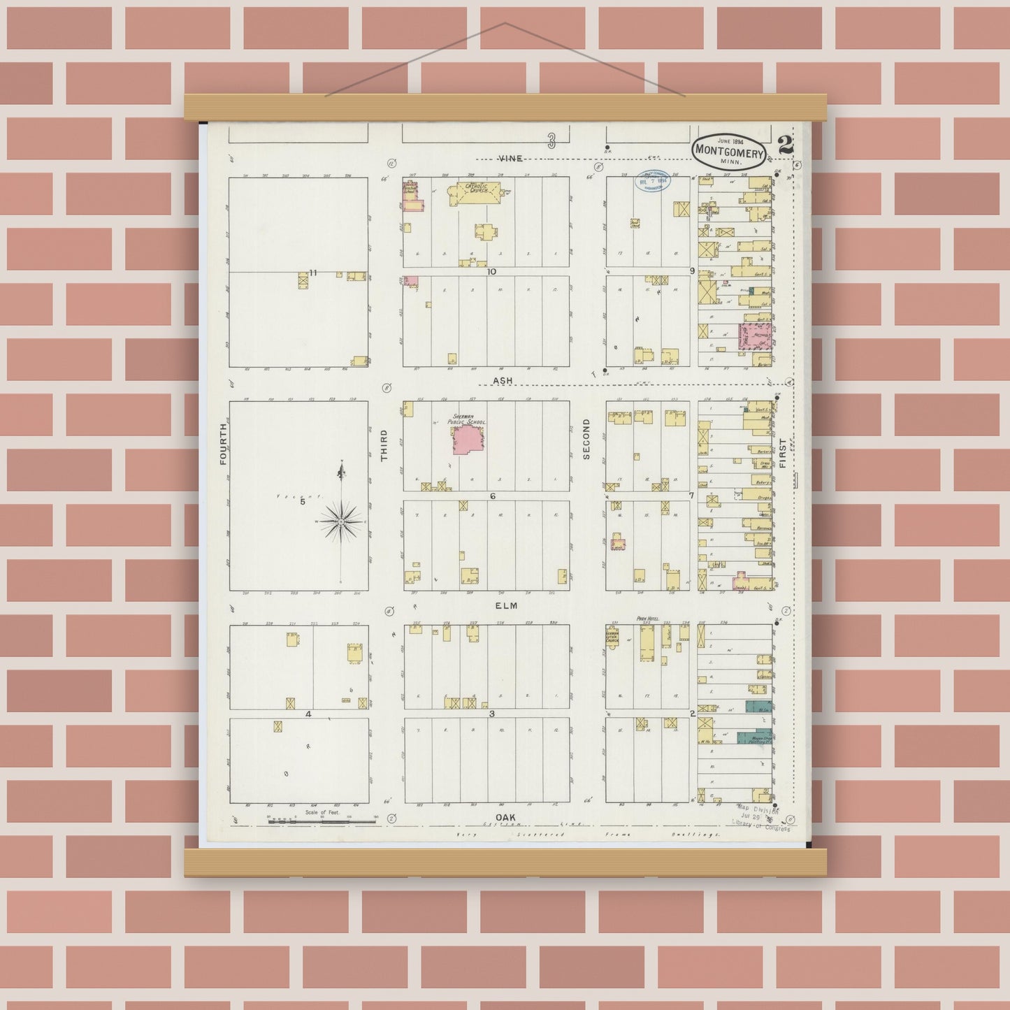 Old map wall art mockup — magnetic wood frame on brick wall — Sanborn Fire Insurance Map from Montgomery, Le Sueur  County, Minnesota (1894), Sheet #0002