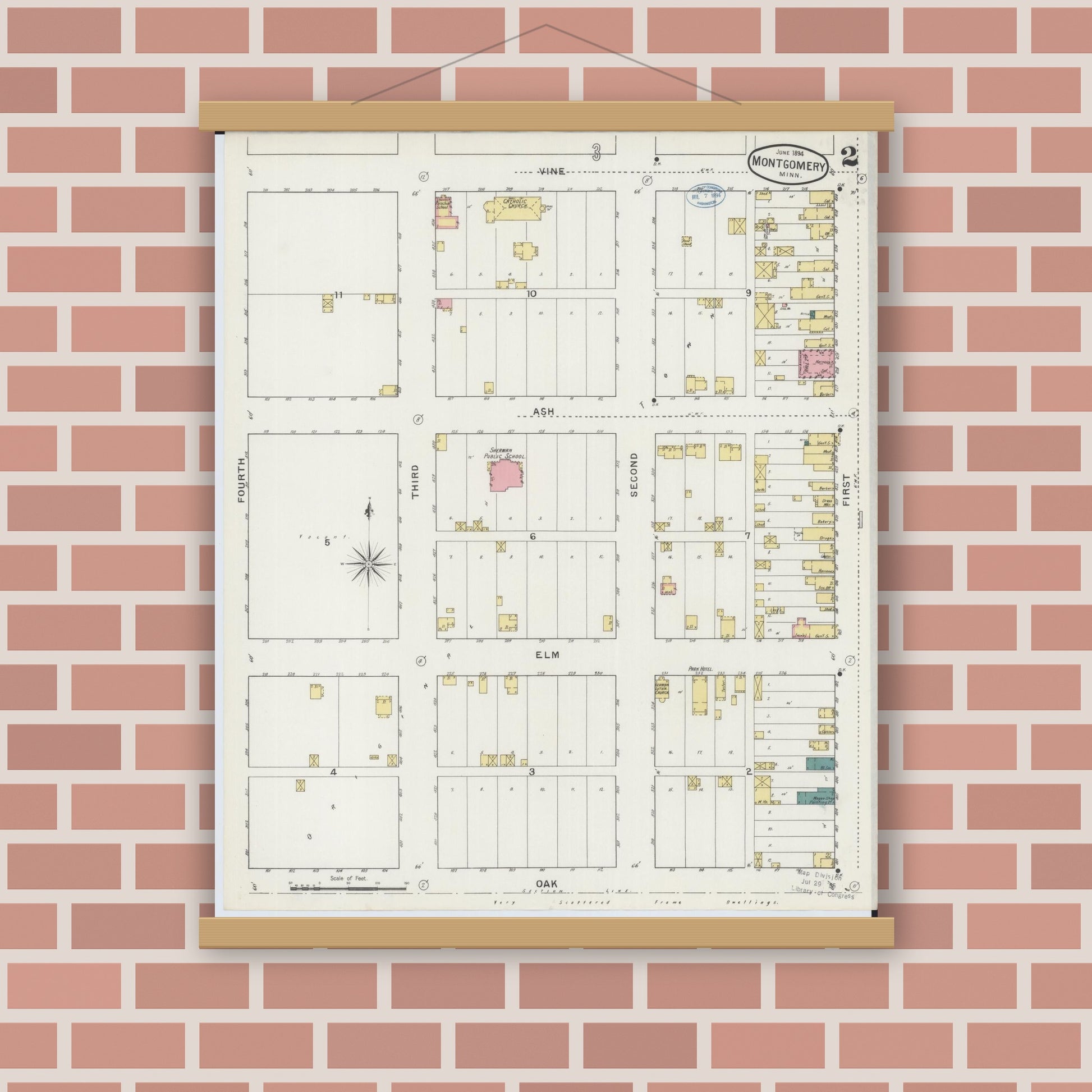 Old map wall art mockup — magnetic wood frame on brick wall — Sanborn Fire Insurance Map from Montgomery, Le Sueur  County, Minnesota (1894), Sheet #0002