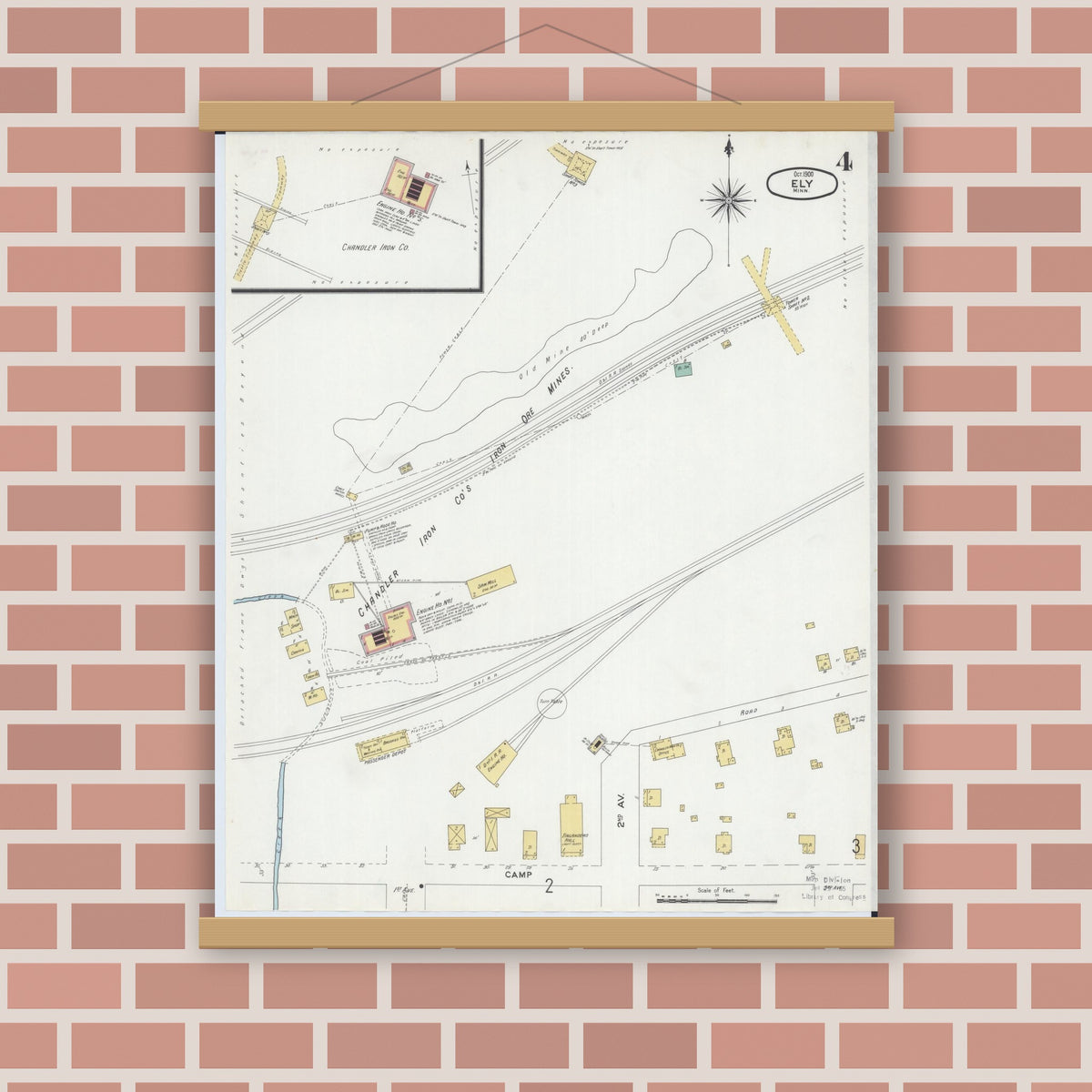 Old map wall art mockup — magnetic wood frame on brick wall — Sanborn Fire Insurance Map from Ely, Saint Louis County, Minnesota (1900), Sheet #0004