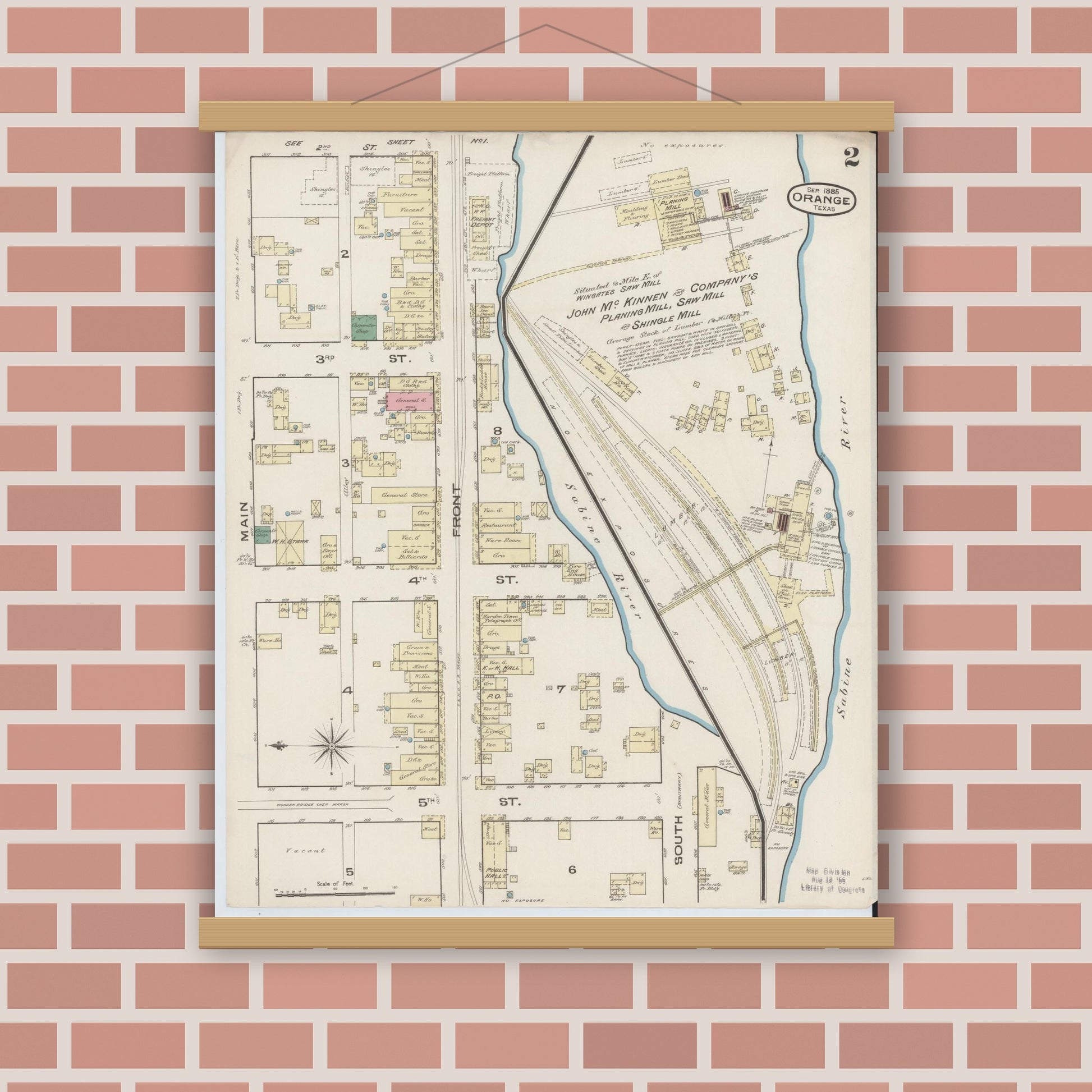 Old map wall art mockup — magnetic wood frame on brick wall — Sanborn Fire Insurance Map from Orange, Orange County, Texas (1885), Sheet #0002