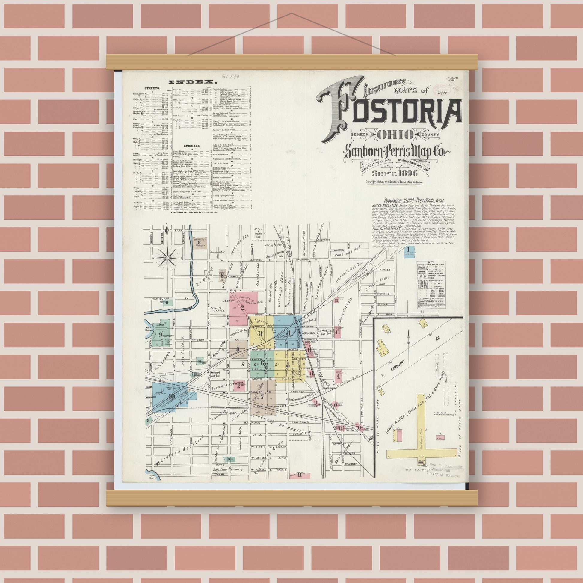 Old map wall art mockup — magnetic wood frame on brick wall — Sanborn Fire Insurance Map from Fostoria, Seneca, Hancock, And Wood Counties, Ohio (1896), Sheet #0001