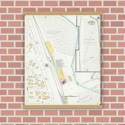 Old map wall art mockup — magnetic wood frame on brick wall — Sanborn Fire Insurance Map from Phillips, Price County, Wisconsin (1901), Sheet #0002
