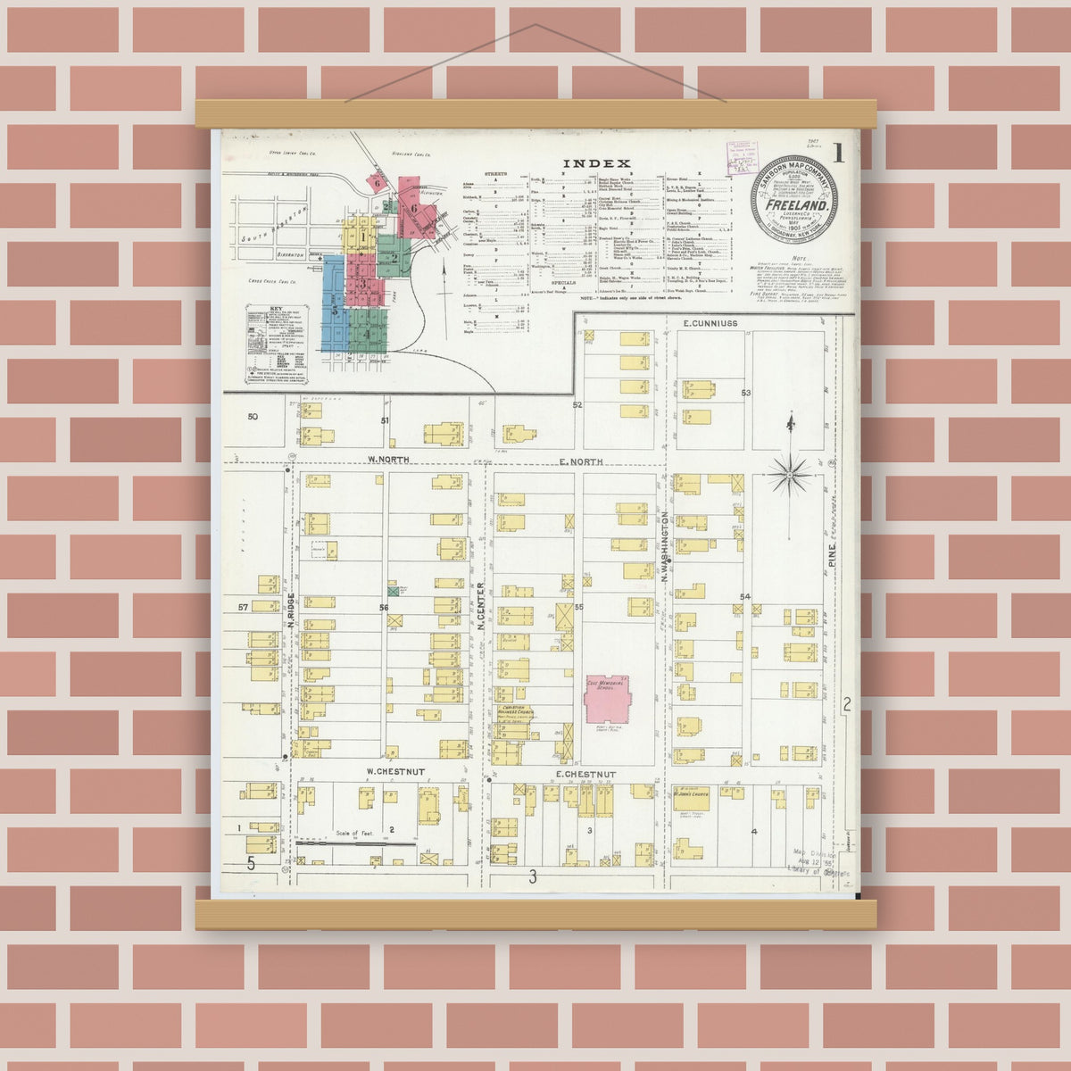 Old map wall art mockup — magnetic wood frame on brick wall — Sanborn Fire Insurance Map from Freeland, Luzerne County, Pennsylvania (1905), Sheet #0001