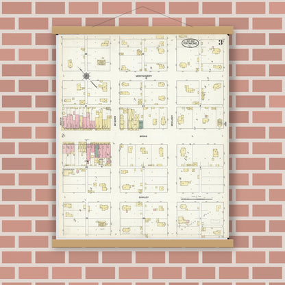 Old map wall art mockup — magnetic wood frame on brick wall — Sanborn Fire Insurance Map from Raymond, Montgomery County, Illinois (1909), Sheet #0003