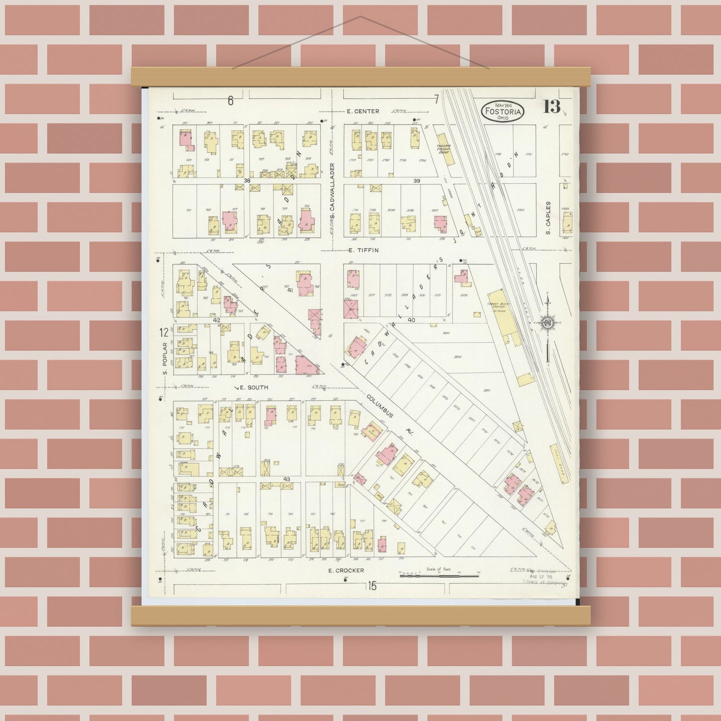 Old map wall art mockup — magnetic wood frame on brick wall — Sanborn Fire Insurance Map from Fostoria, Seneca, Hancock, And Wood Counties, Ohio (1914), Sheet #0013