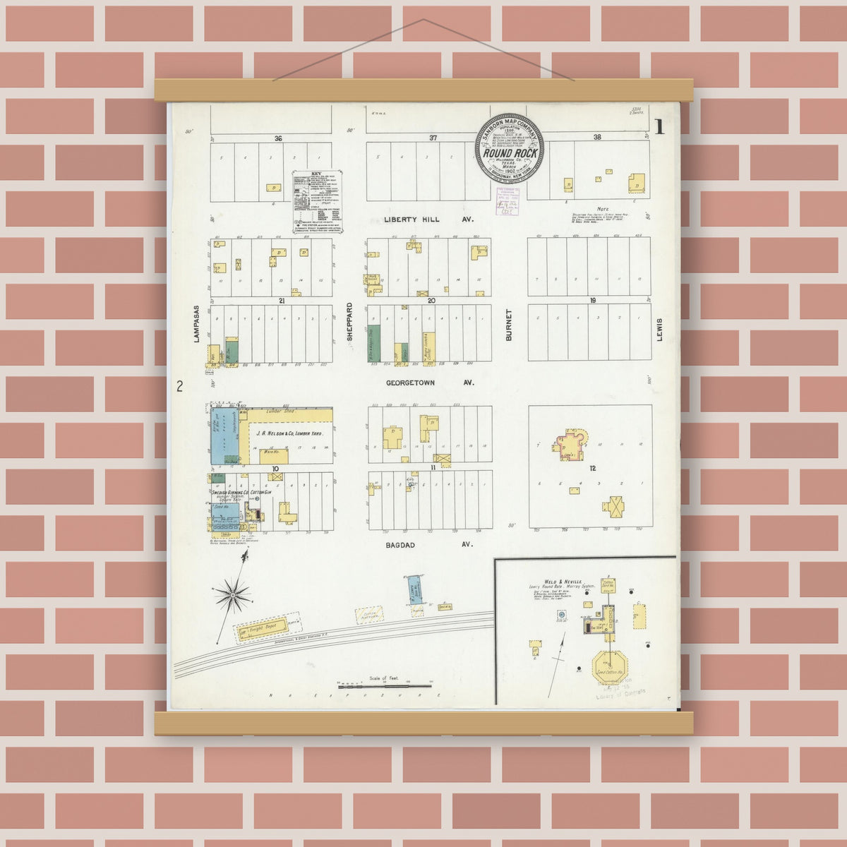 Old map wall art mockup — magnetic wood frame on brick wall — Sanborn Fire Insurance Map from Round Rock, Williamson County, Texas (1902), Sheet #0001