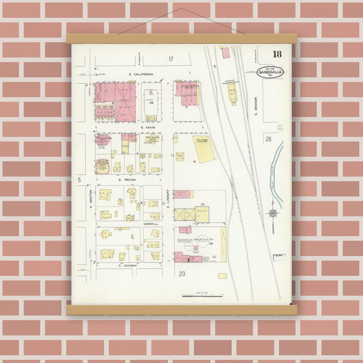 Old map wall art mockup — magnetic wood frame on brick wall — Sanborn Fire Insurance Map from Gainesville, Cooke County, Texas (1913), Sheet #0018