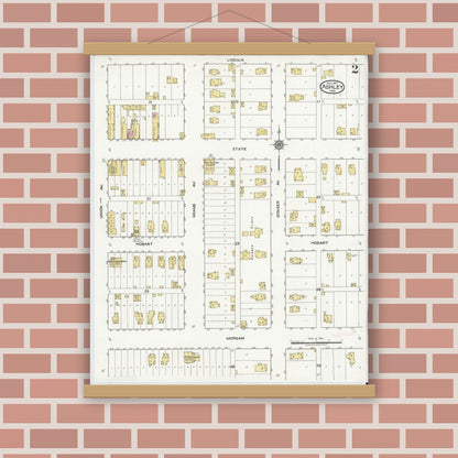 Old map wall art mockup — magnetic wood frame on brick wall — Sanborn Fire Insurance Map from Ashley, Steuben County, Indiana (1917), Sheet #0002