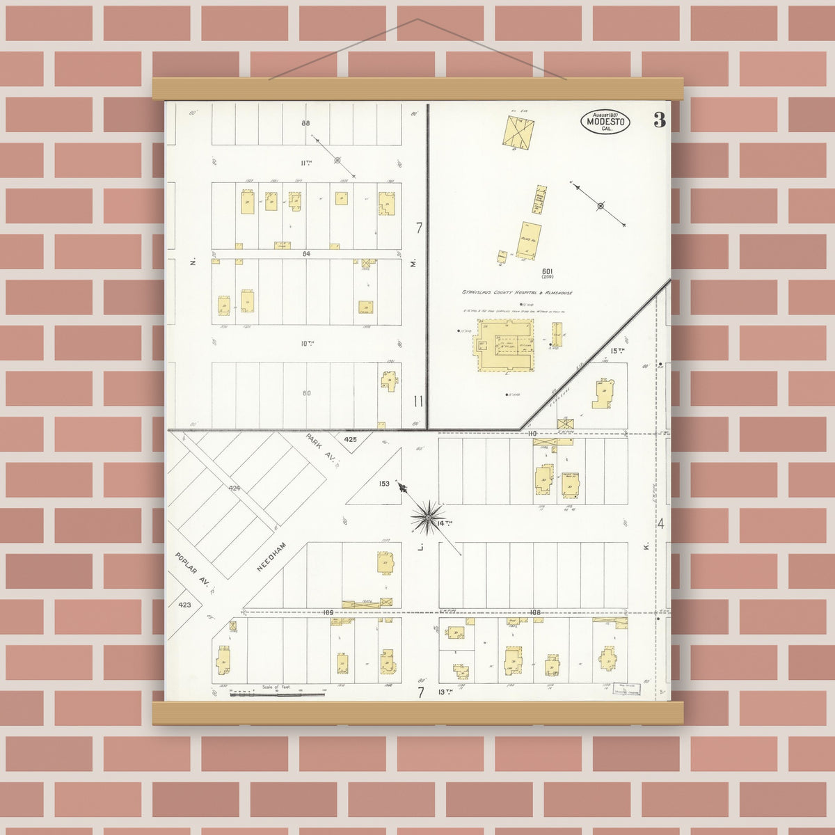 Old map wall art mockup — magnetic wood frame on brick wall — Sanborn Fire Insurance Map from Modesto, Stanislaus County, California (1907), Sheet #0003