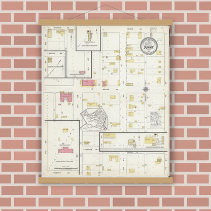 Old map wall art mockup — magnetic wood frame on brick wall — Sanborn Fire Insurance Map from Donna, Hidalgo County, Texas (1917), Sheet #0001