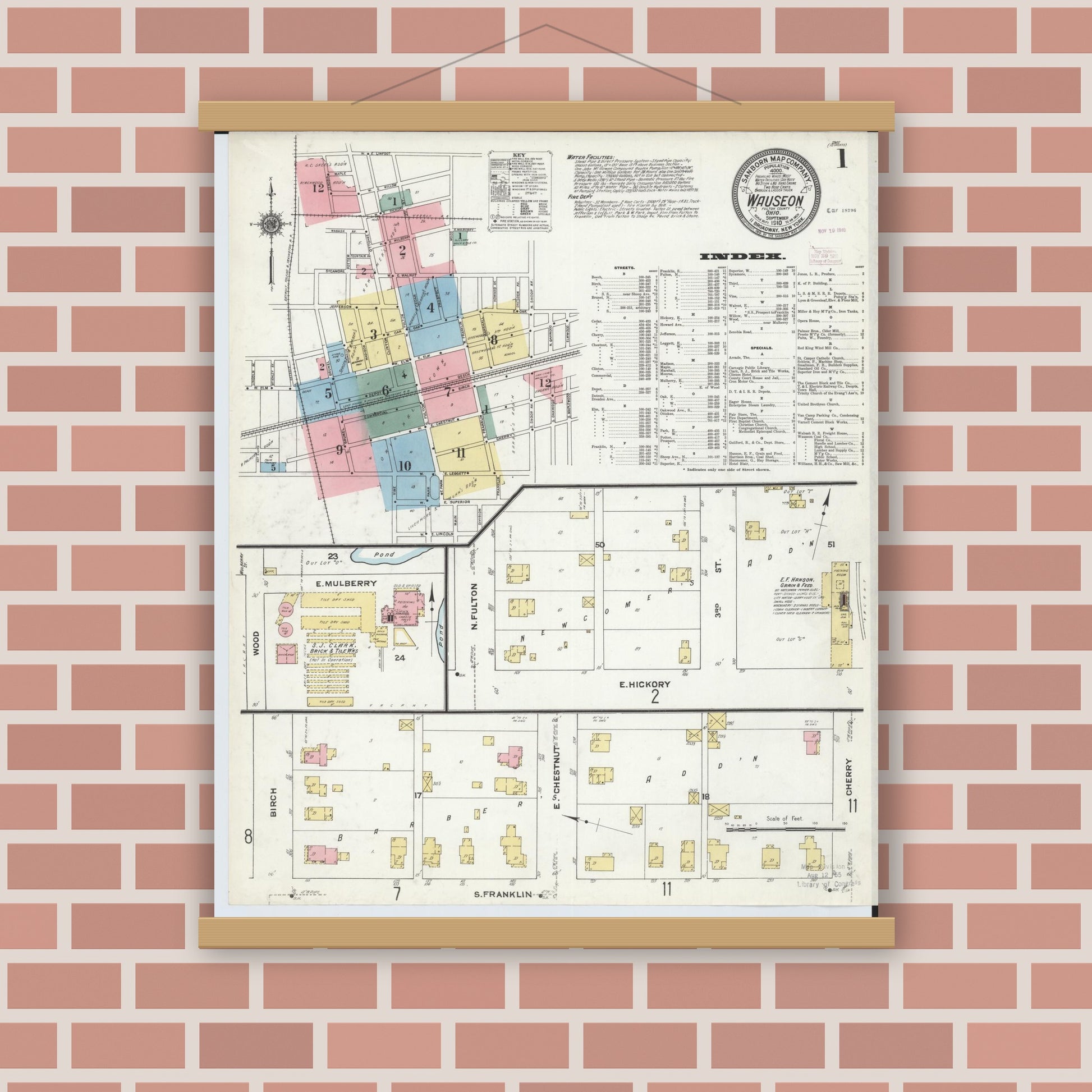 Old map wall art mockup — magnetic wood frame on brick wall — Sanborn Fire Insurance Map from Wauseon, Fulton County, Ohio (1910), Sheet #0001