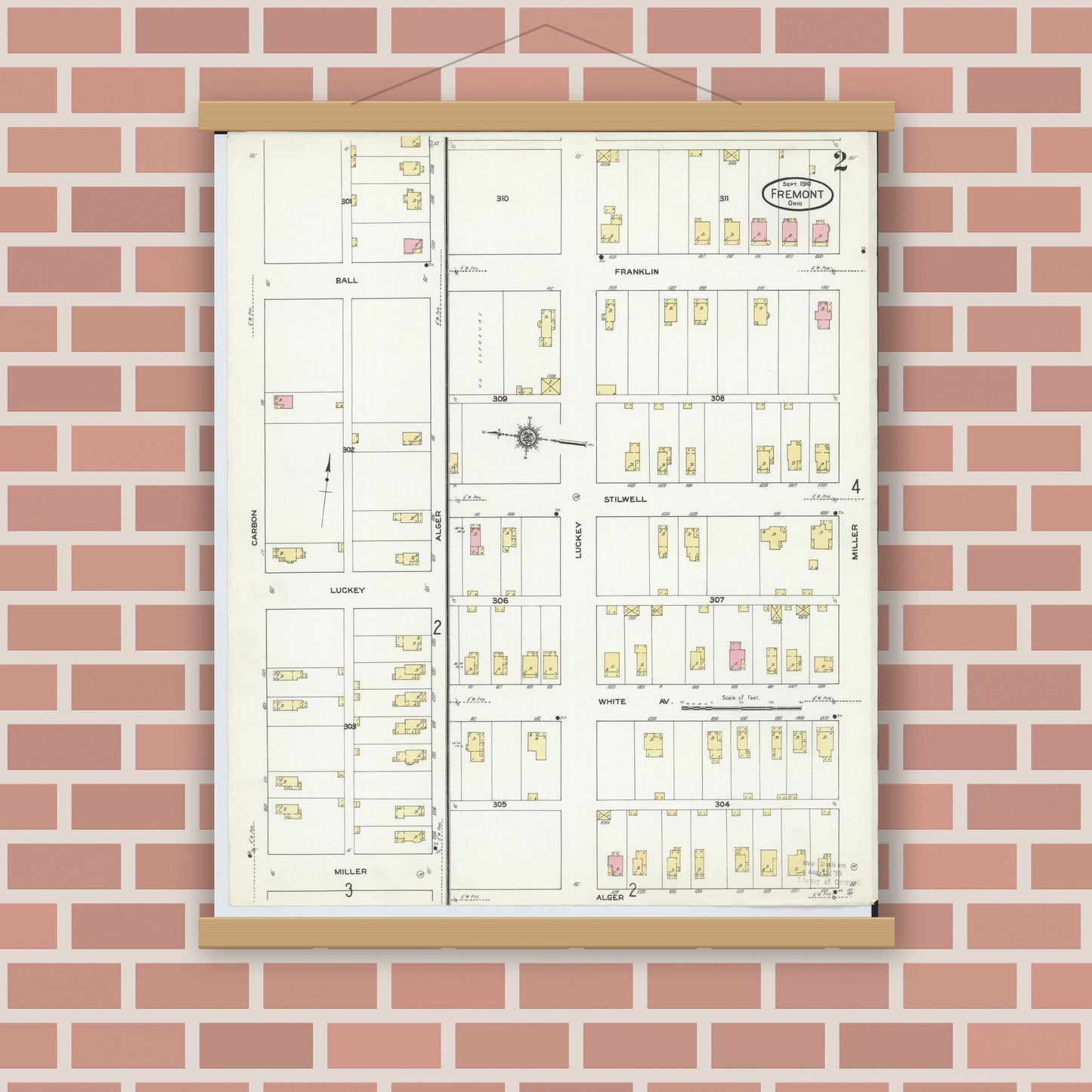 Old map wall art mockup — magnetic wood frame on brick wall — Sanborn Fire Insurance Map from Fremont, Sandusky County, Ohio (1910), Sheet #0002