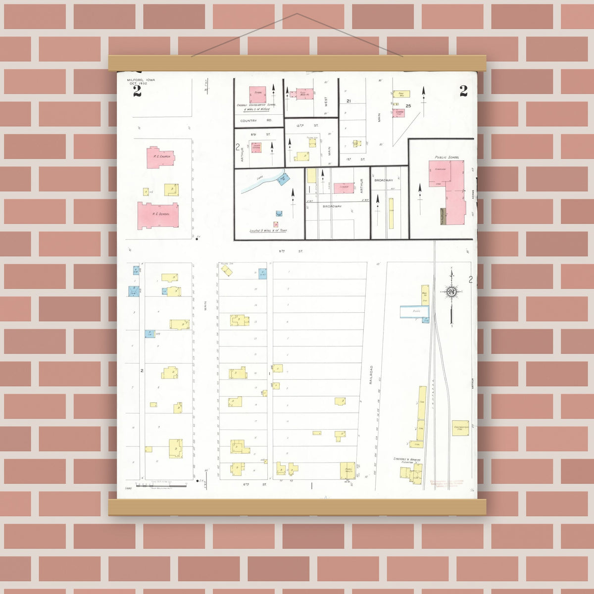 Old map wall art mockup — magnetic wood frame on brick wall — Sanborn Fire Insurance Map from Milford, Dickinson County, Iowa (1932), Sheet #0002