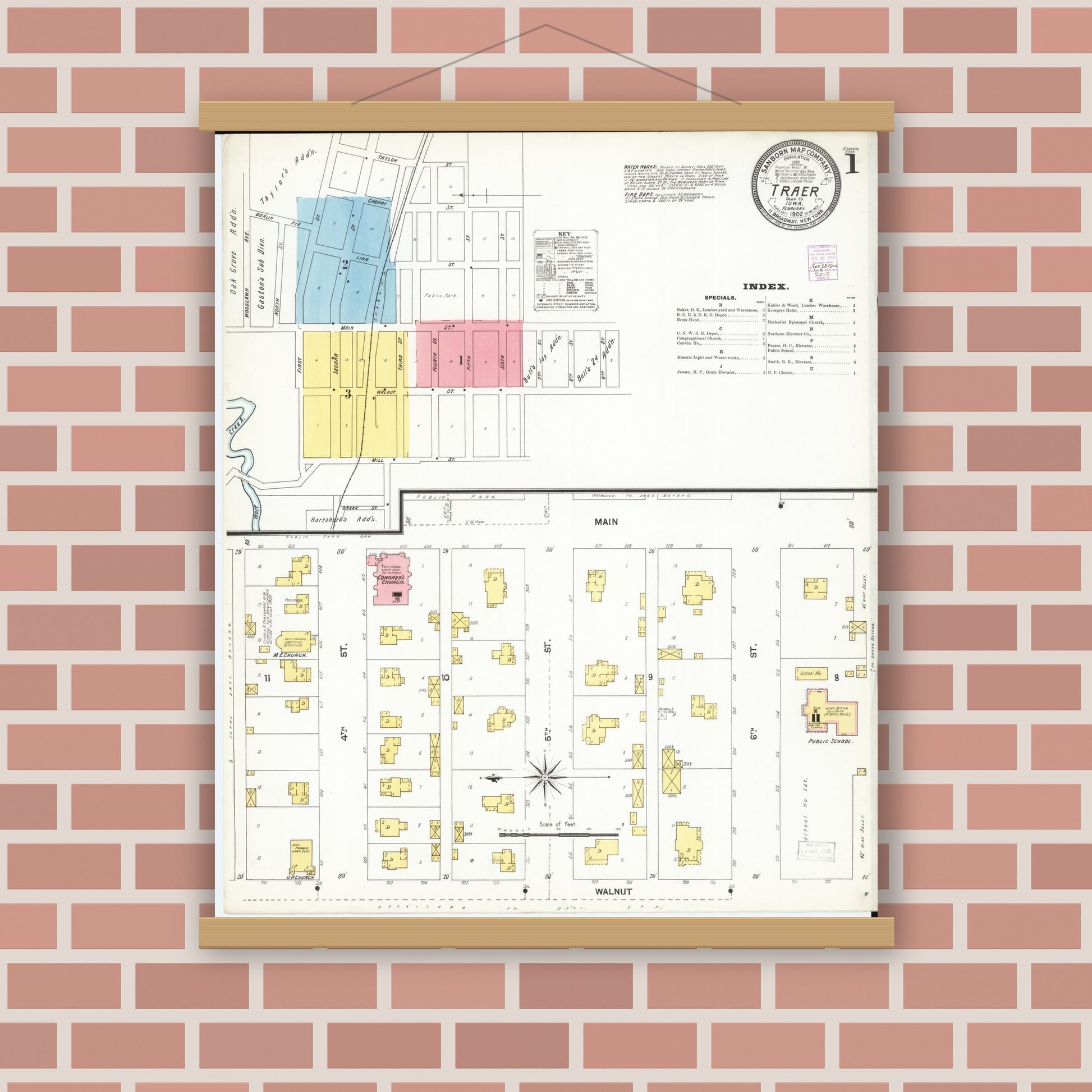 Old map wall art mockup — magnetic wood frame on brick wall — Sanborn Fire Insurance Map from Traer, Tama County, Iowa (1902), Sheet #0001