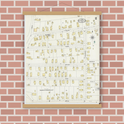 Old map wall art mockup — magnetic wood frame on brick wall — Sanborn Fire Insurance Map from Wakefield, Middlesex County, Massachusetts (1897), Sheet #0002