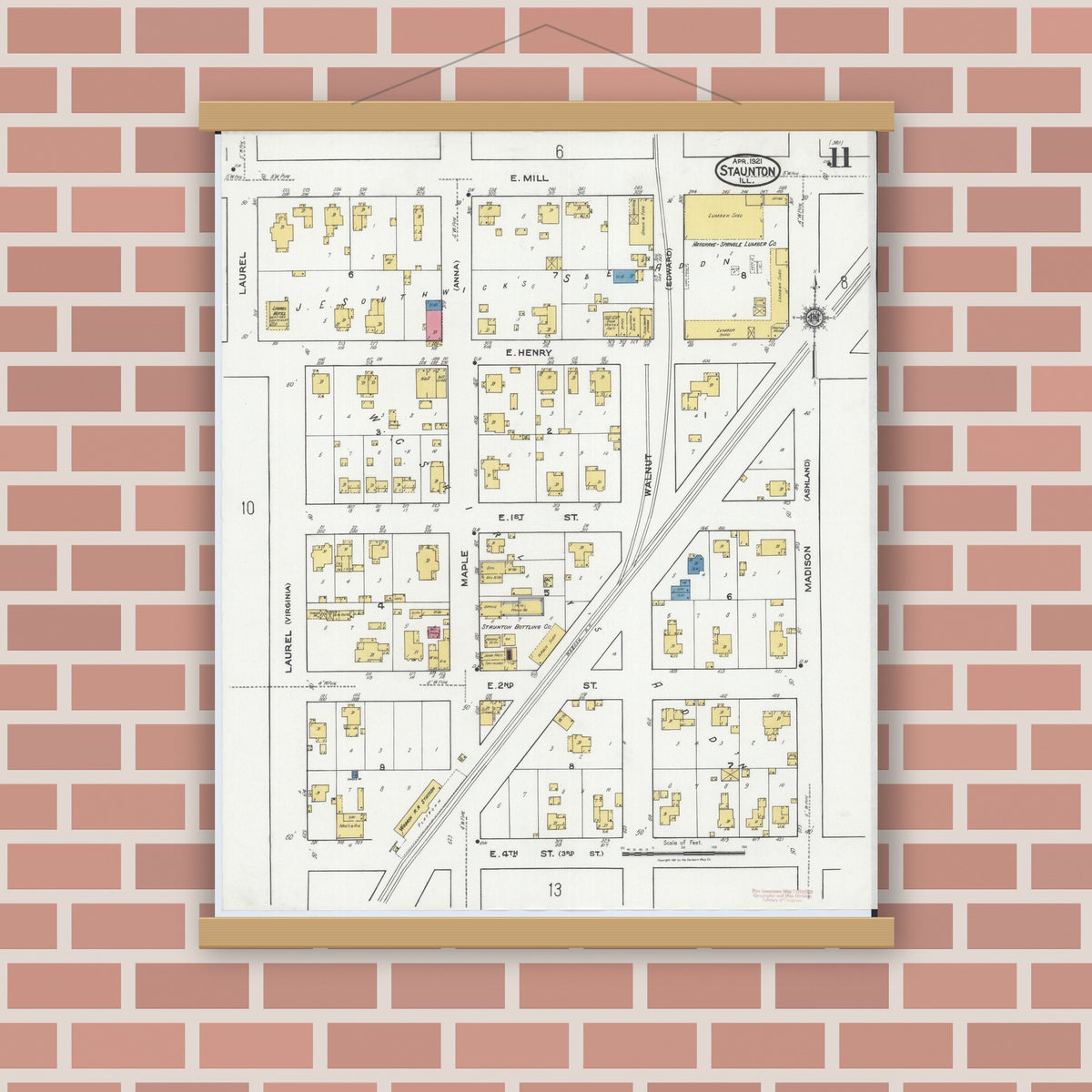 Old map wall art mockup — magnetic wood frame on brick wall — Sanborn Fire Insurance Map from Staunton, Macoupin County, Illinois (1921), Sheet #0011