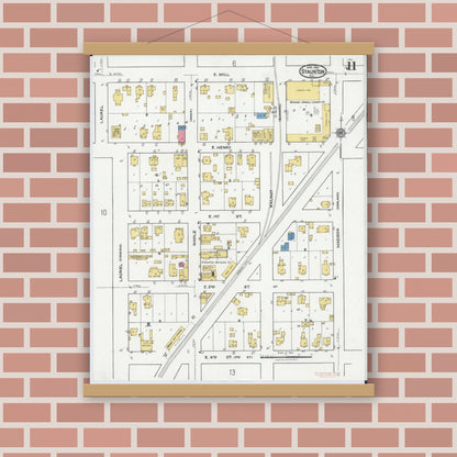 Old map wall art mockup — magnetic wood frame on brick wall — Sanborn Fire Insurance Map from Staunton, Macoupin County, Illinois (1921), Sheet #0011
