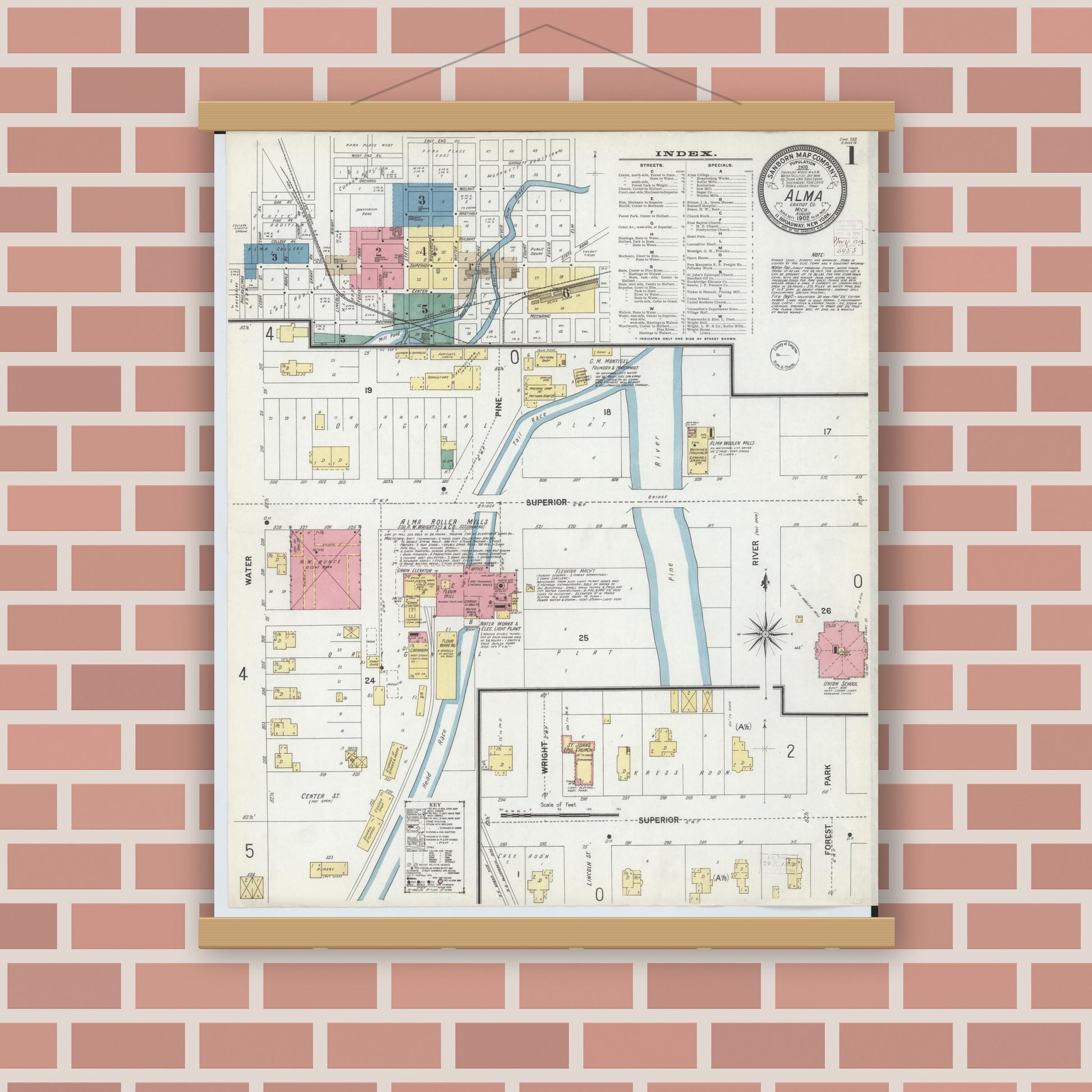 Old map wall art mockup — magnetic wood frame on brick wall — Sanborn Fire Insurance Map from Alma, Gratiot County, Michigan (1902), Sheet #0001