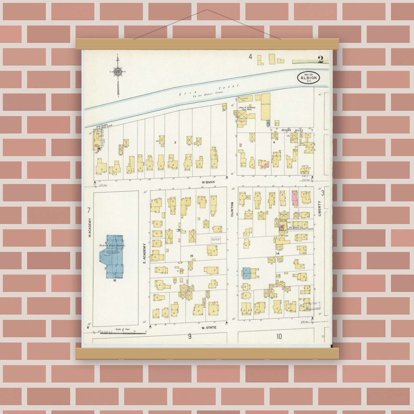 Old map wall art mockup — magnetic wood frame on brick wall — Sanborn Fire Insurance Map from Albion, Orleans County, New York (1911) - Complete Map Set