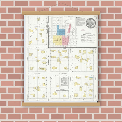 Old map wall art mockup — magnetic wood frame on brick wall — Sanborn Fire Insurance Map from Stanton, Montcalm County, Michigan (1911) - Complete Map Set