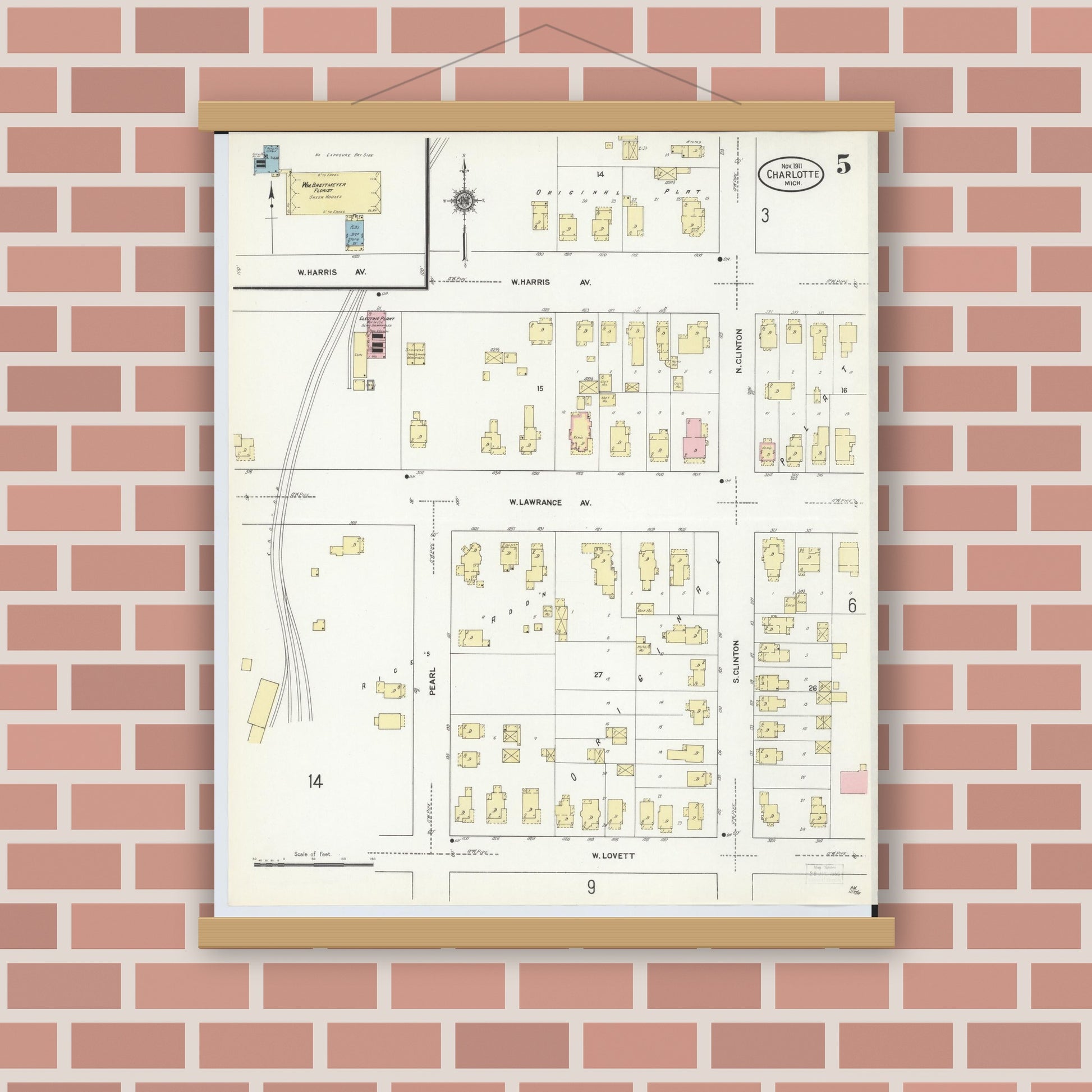 Old map wall art mockup — magnetic wood frame on brick wall — Sanborn Fire Insurance Map from Charlotte, Eaton County, Michigan (1911), Sheet #0005