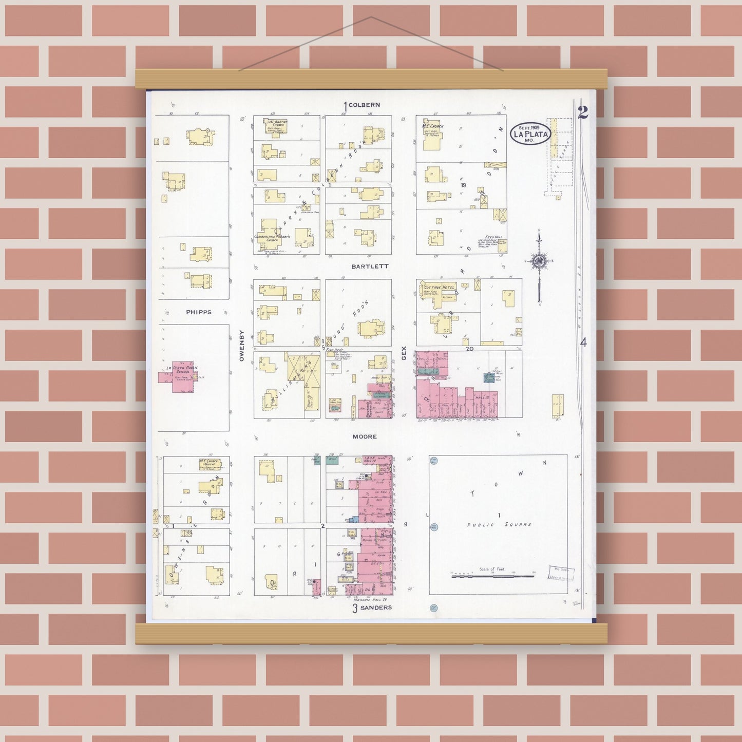 Old map wall art mockup — magnetic wood frame on brick wall — Sanborn Fire Insurance Map from La Plata, Macon County, Missouri (1909), Sheet #0002