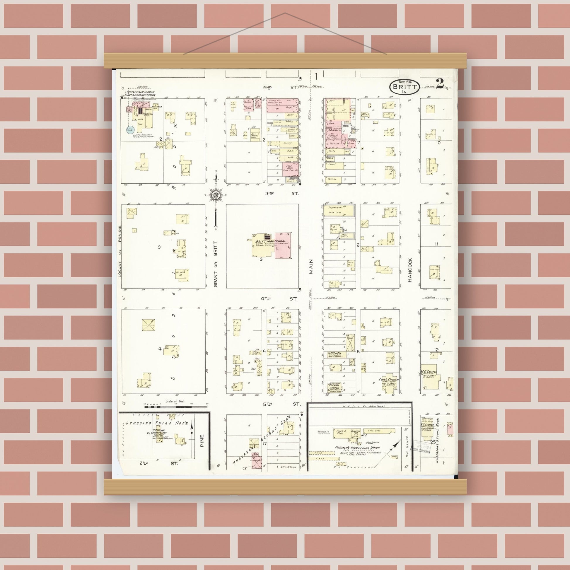 Old map wall art mockup — magnetic wood frame on brick wall — Sanborn Fire Insurance Map from Britt, Hancock County, Iowa (1914), Sheet #0002