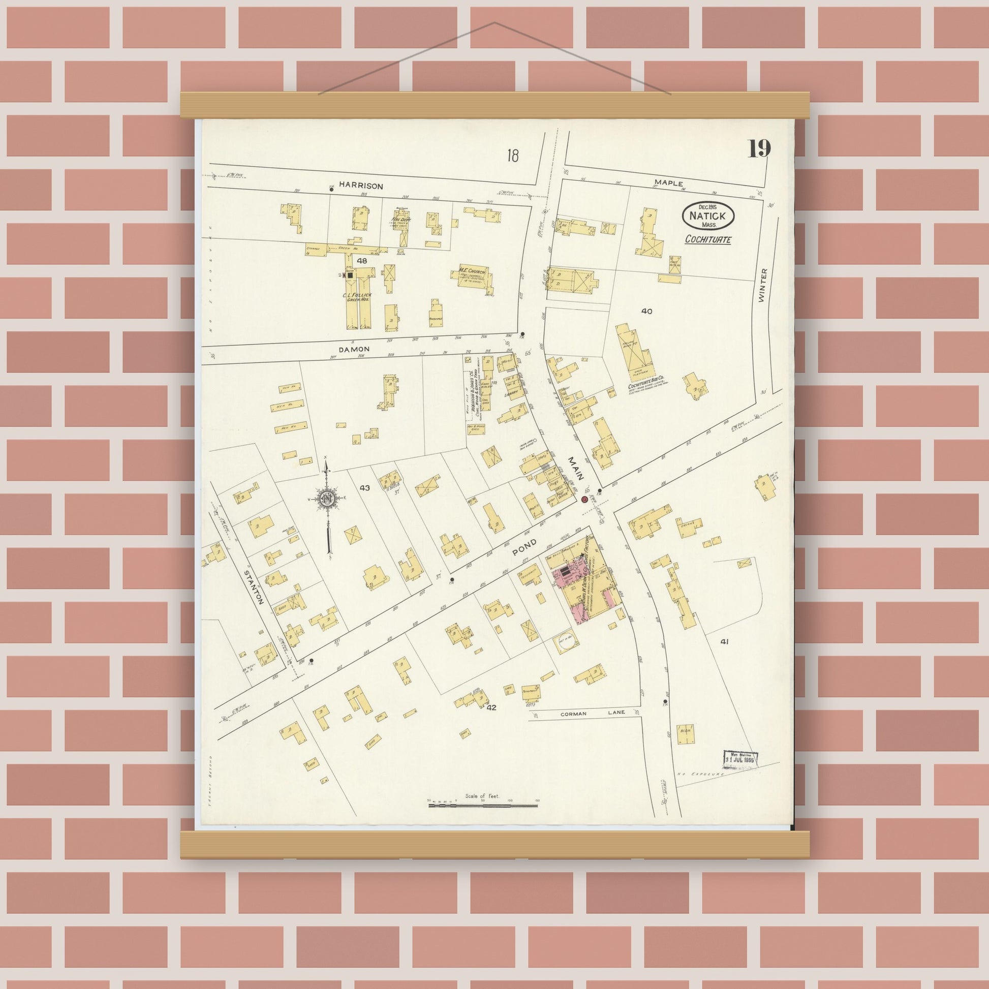 Old map wall art mockup — magnetic wood frame on brick wall — Sanborn Fire Insurance Map from Natick, Middlesex County, Massachusetts (1915), Sheet #0019