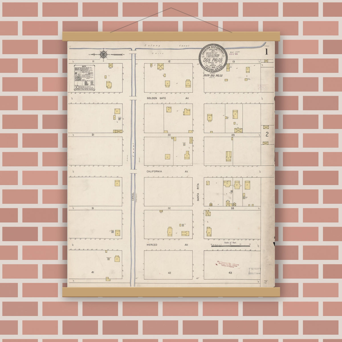 Old map wall art mockup — magnetic wood frame on brick wall — Sanborn Fire Insurance Map from Dos Palos, Merced County, California (1910), Sheet #0001