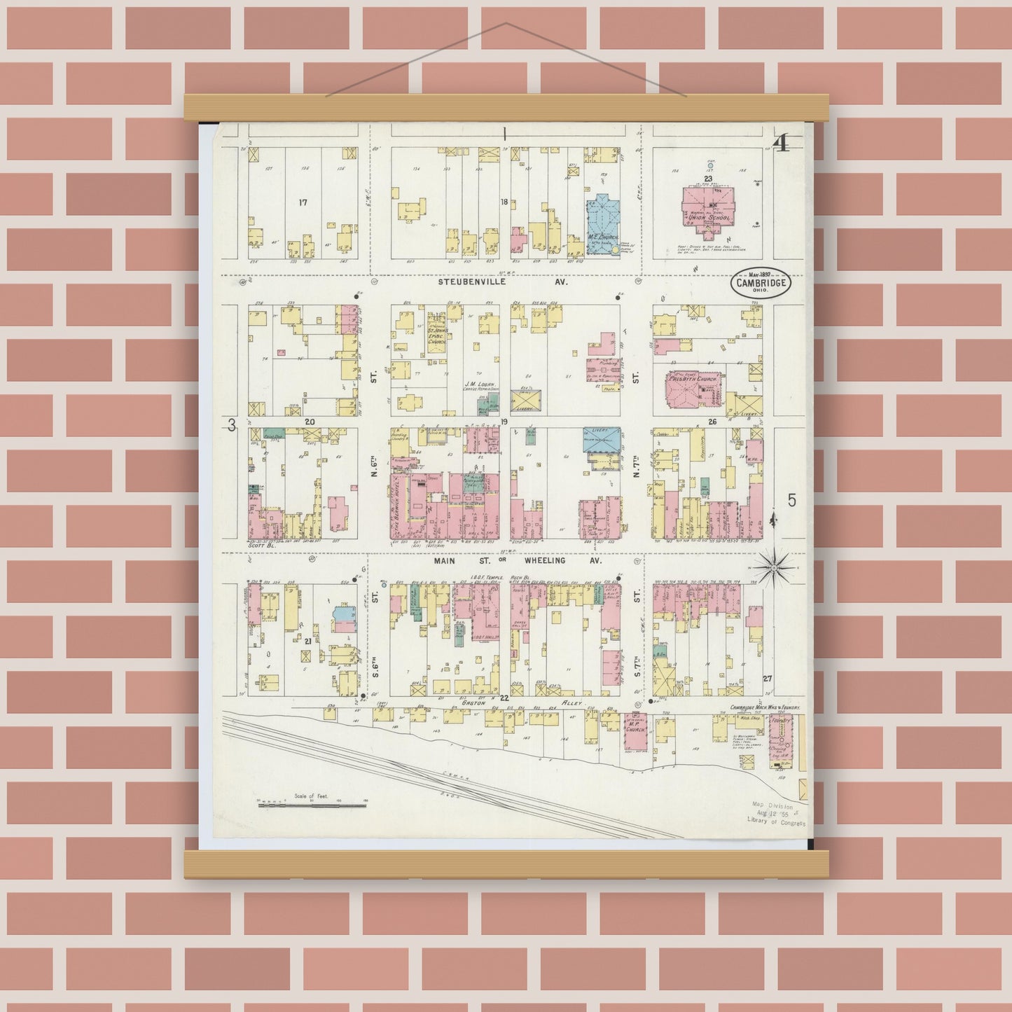 Old map wall art mockup — magnetic wood frame on brick wall — Sanborn Fire Insurance Map from Cambridge, Guernsey County, Ohio (1897), Sheet #0004
