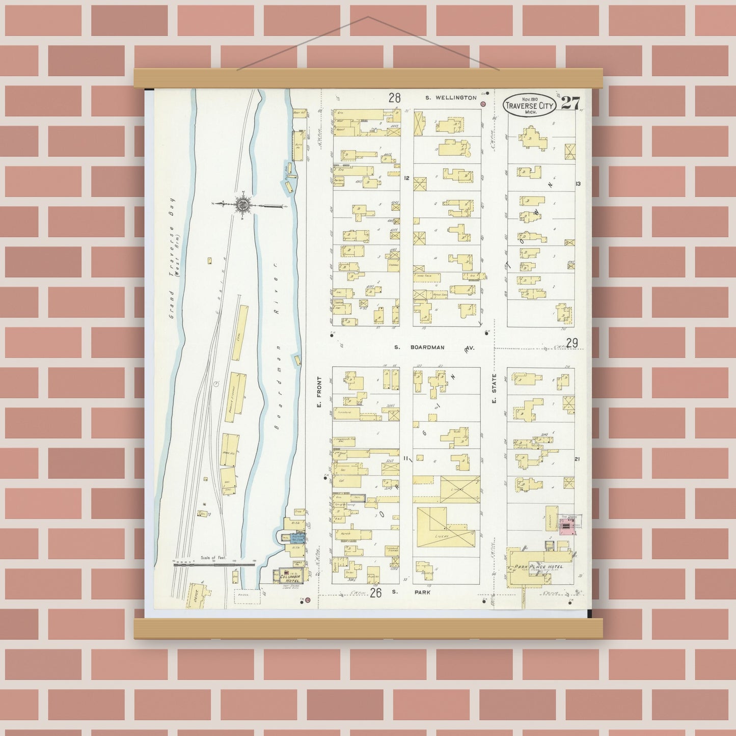 Old map wall art mockup — magnetic wood frame on brick wall — Sanborn Fire Insurance Map from Traverse City, Grand Traverse County, Michigan (1910), Sheet #0027