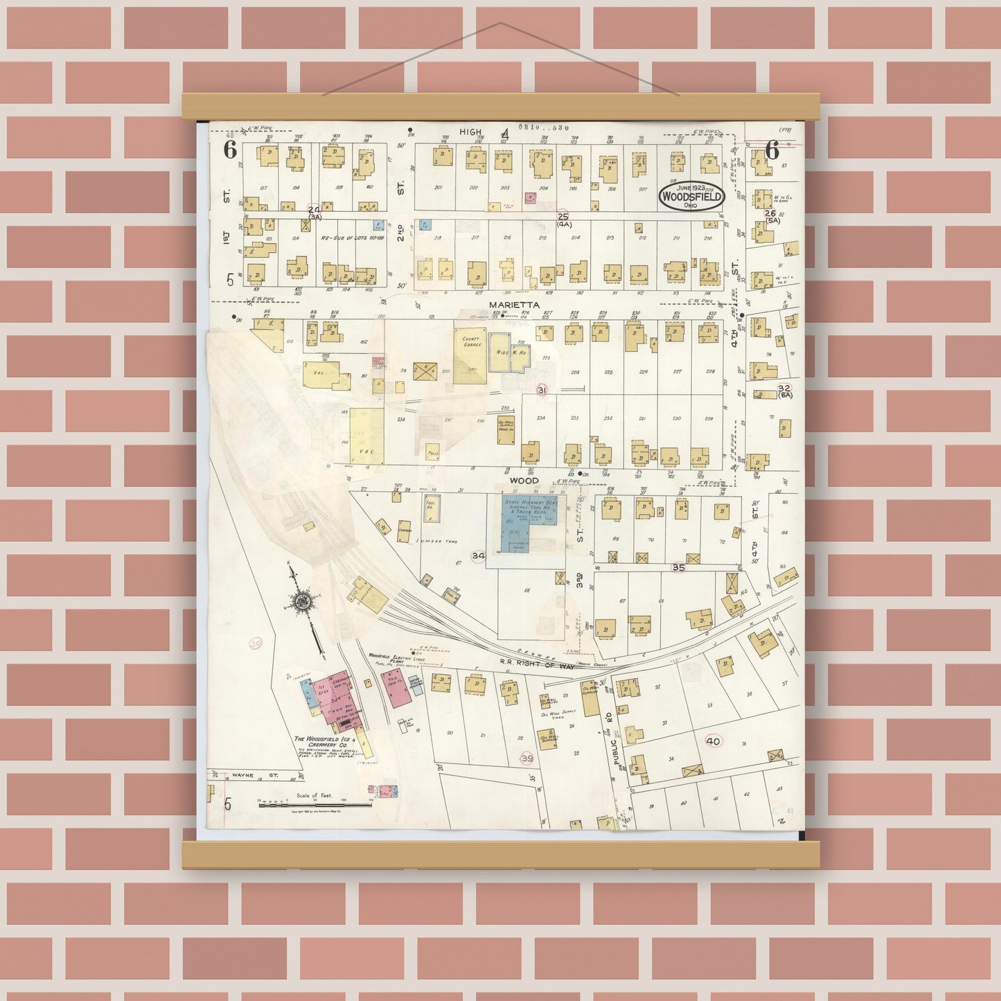 Old map wall art mockup — magnetic wood frame on brick wall — Sanborn Fire Insurance Map from Woodsfield, Monroe County, Ohio (1949), Sheet #0006