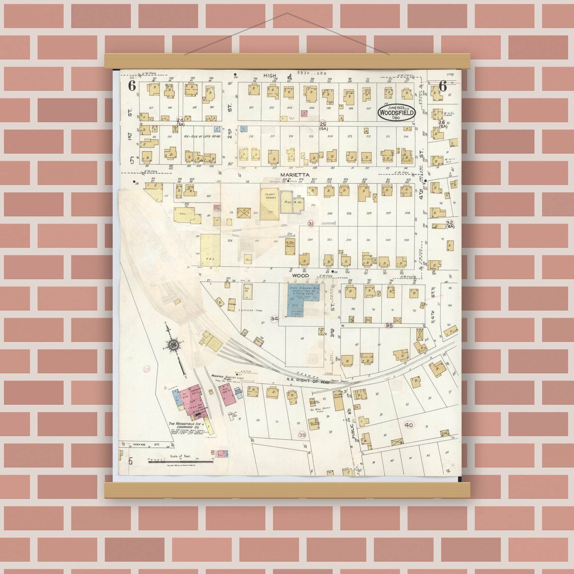 Old map wall art mockup — magnetic wood frame on brick wall — Sanborn Fire Insurance Map from Woodsfield, Monroe County, Ohio (1949), Sheet #0006