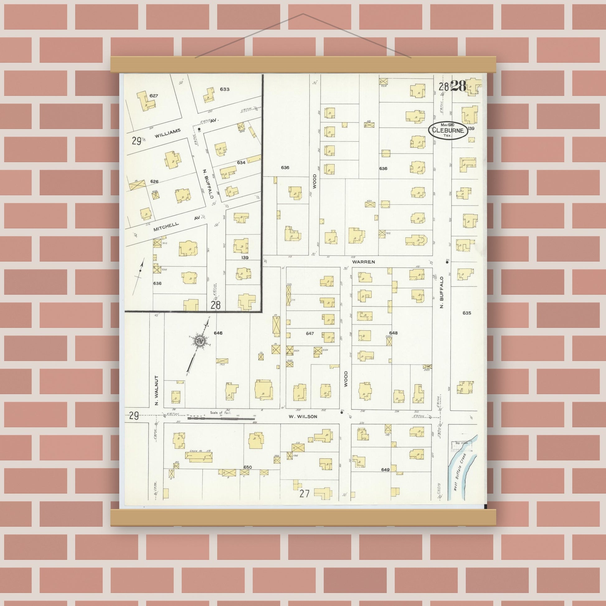 Old map wall art mockup — magnetic wood frame on brick wall — Sanborn Fire Insurance Map from Cleburne, Johnson County, Texas (1910), Sheet #0028