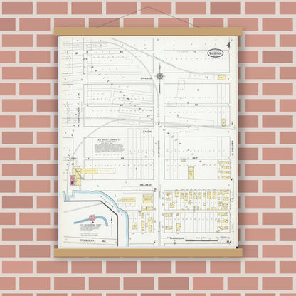 Old map wall art mockup — magnetic wood frame on brick wall — Sanborn Fire Insurance Map from Virginia, Saint Louis County, Minnesota (1915), Sheet #0004