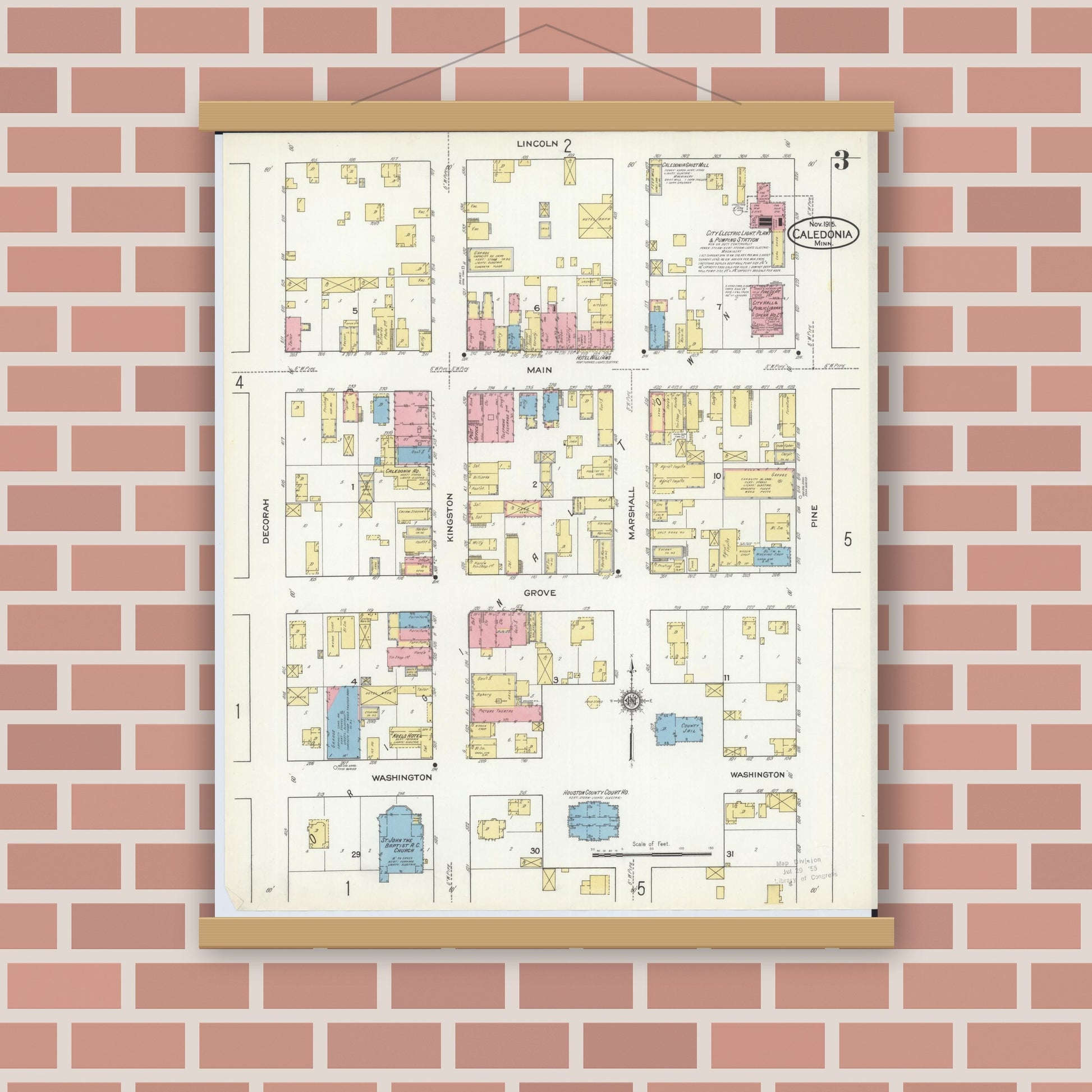 Old map wall art mockup — magnetic wood frame on brick wall — Sanborn Fire Insurance Map from Caledonia, Houston County, Minnesota (1915), Sheet #0003