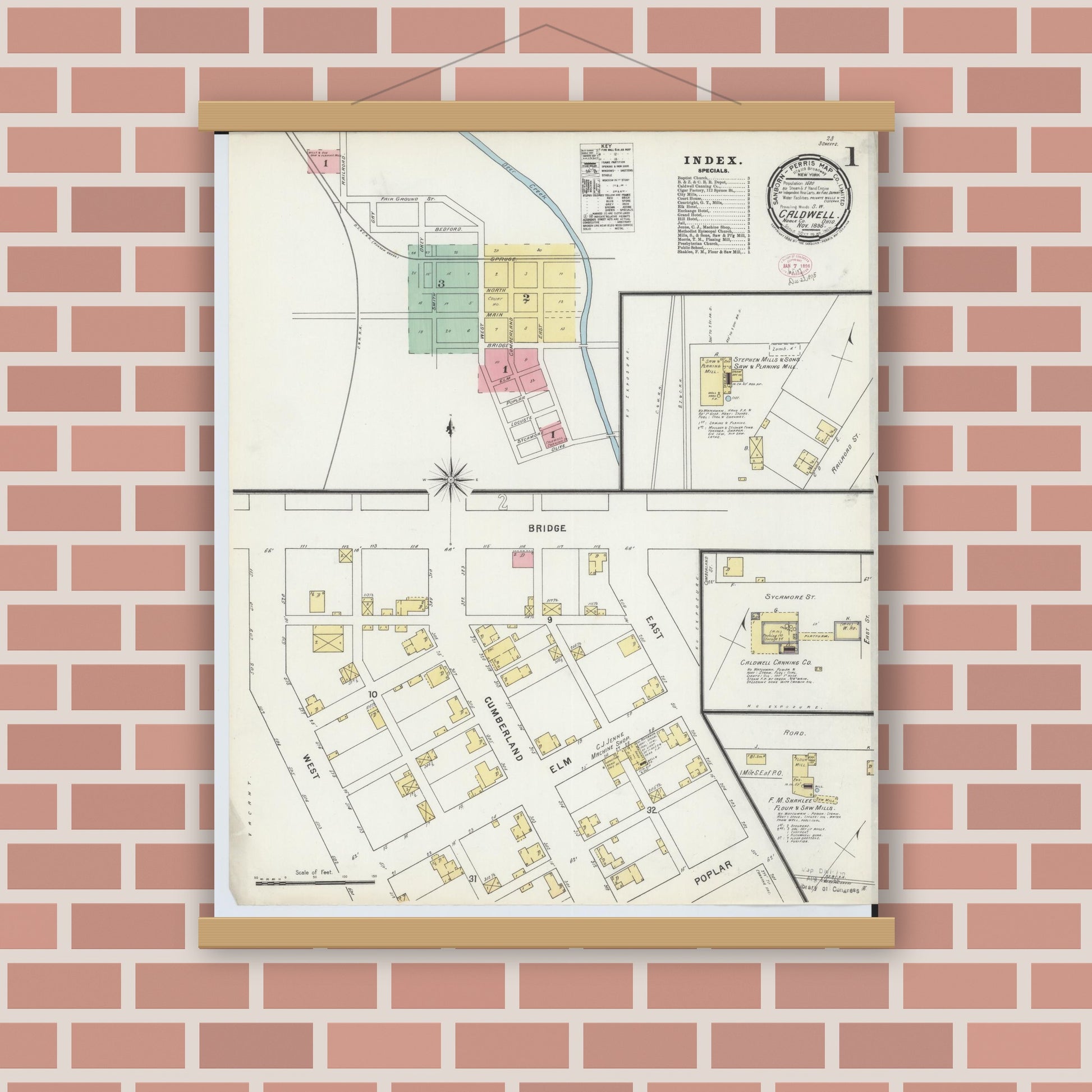 Old map wall art mockup — magnetic wood frame on brick wall — Sanborn Fire Insurance Map from Caldwell, Noble County, Ohio (1895), Sheet #0001