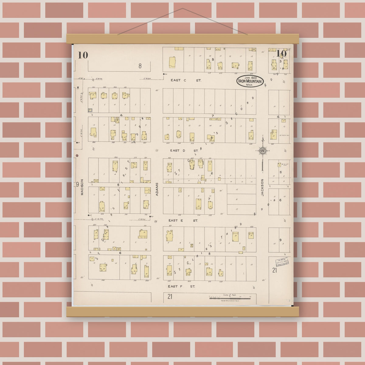 Old map wall art mockup — magnetic wood frame on brick wall — Sanborn Fire Insurance Map from Iron Mountain, Dickinson County, Michigan (1923), Sheet #0010