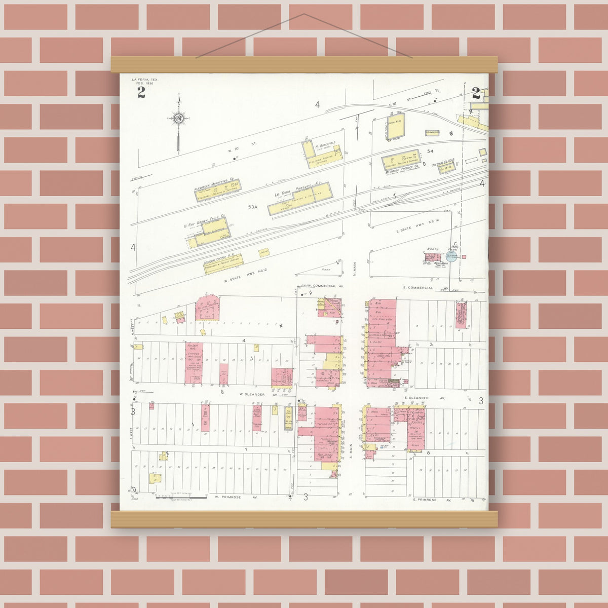 Old map wall art mockup — magnetic wood frame on brick wall — Sanborn Fire Insurance Map from La Feria, Cameron County, Texas (1936), Sheet #0002