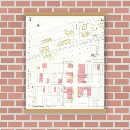 Old map wall art mockup — magnetic wood frame on brick wall — Sanborn Fire Insurance Map from La Feria, Cameron County, Texas (1936), Sheet #0002