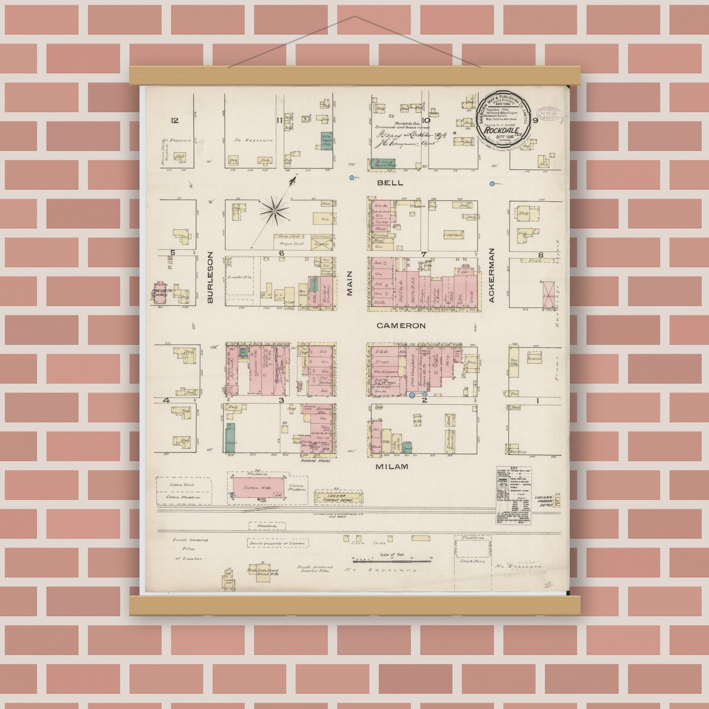 Old map wall art mockup — magnetic wood frame on brick wall — Sanborn Fire Insurance Map from Rockdale, Milam County, Texas (1885), Sheet #0001