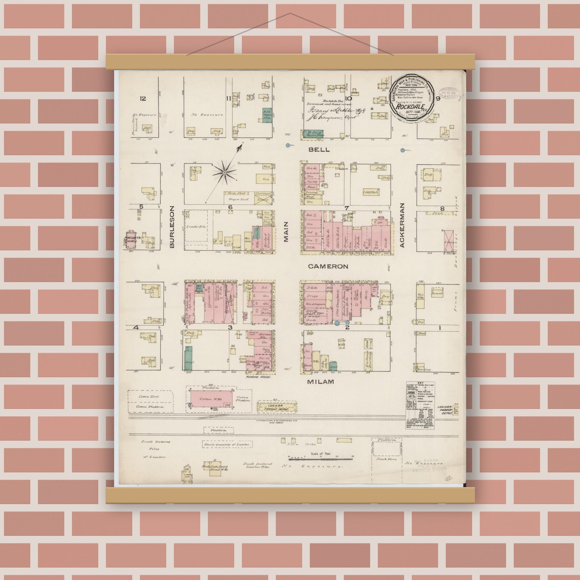 Old map wall art mockup — magnetic wood frame on brick wall — Sanborn Fire Insurance Map from Rockdale, Milam County, Texas (1885), Sheet #0001