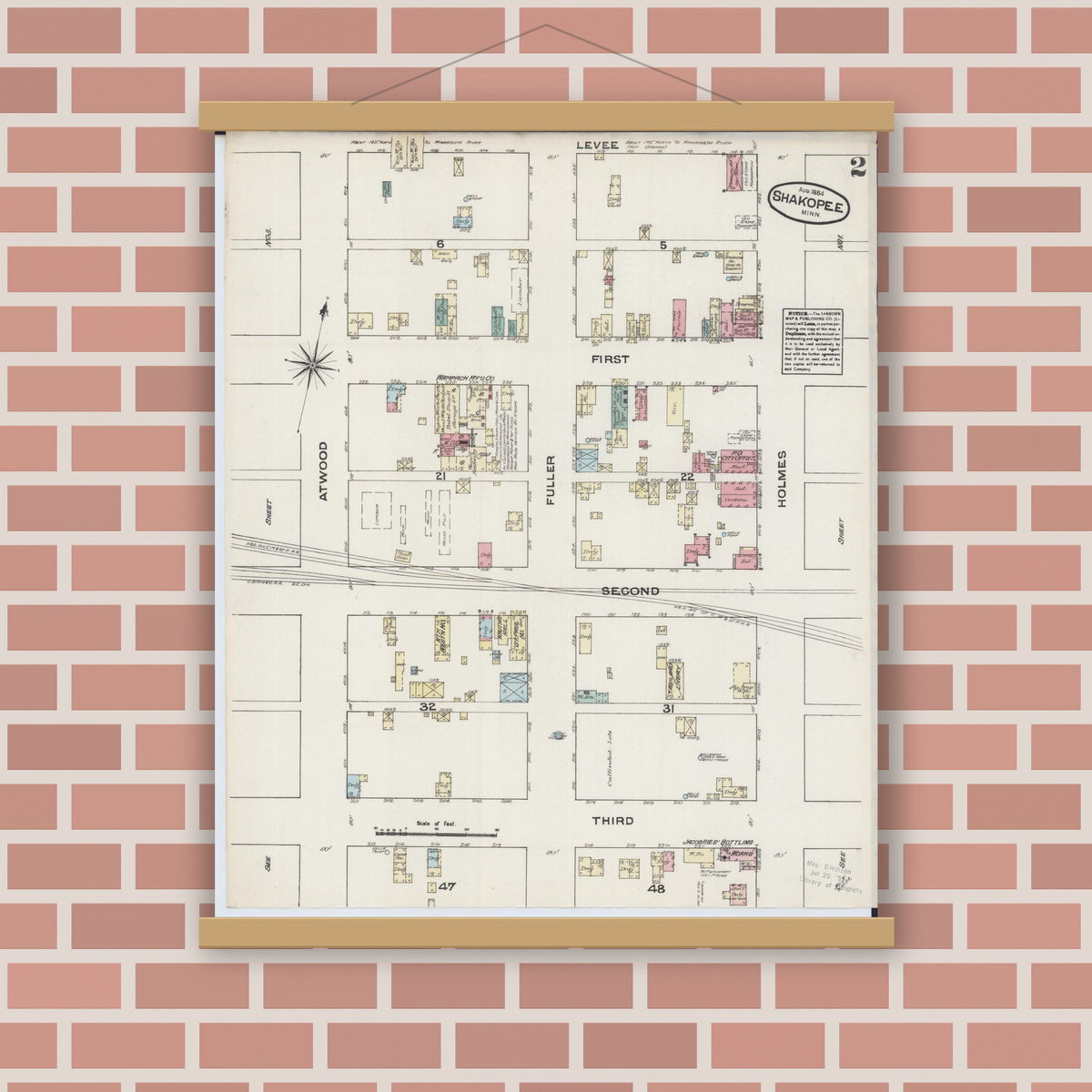 Old map wall art mockup — magnetic wood frame on brick wall — Sanborn Fire Insurance Map from Shakopee, Scott County, Minnesota (1884), Sheet #0002