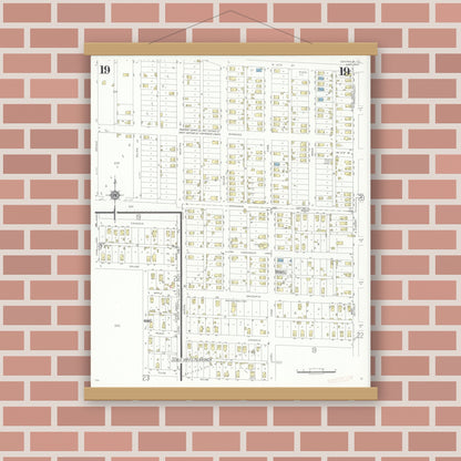 Old map wall art mockup — magnetic wood frame on brick wall — Sanborn Fire Insurance Map from Centralia, Marion, Clinton, Jefferson, and Washington Counties, Illinois (1938), Sheet #0019