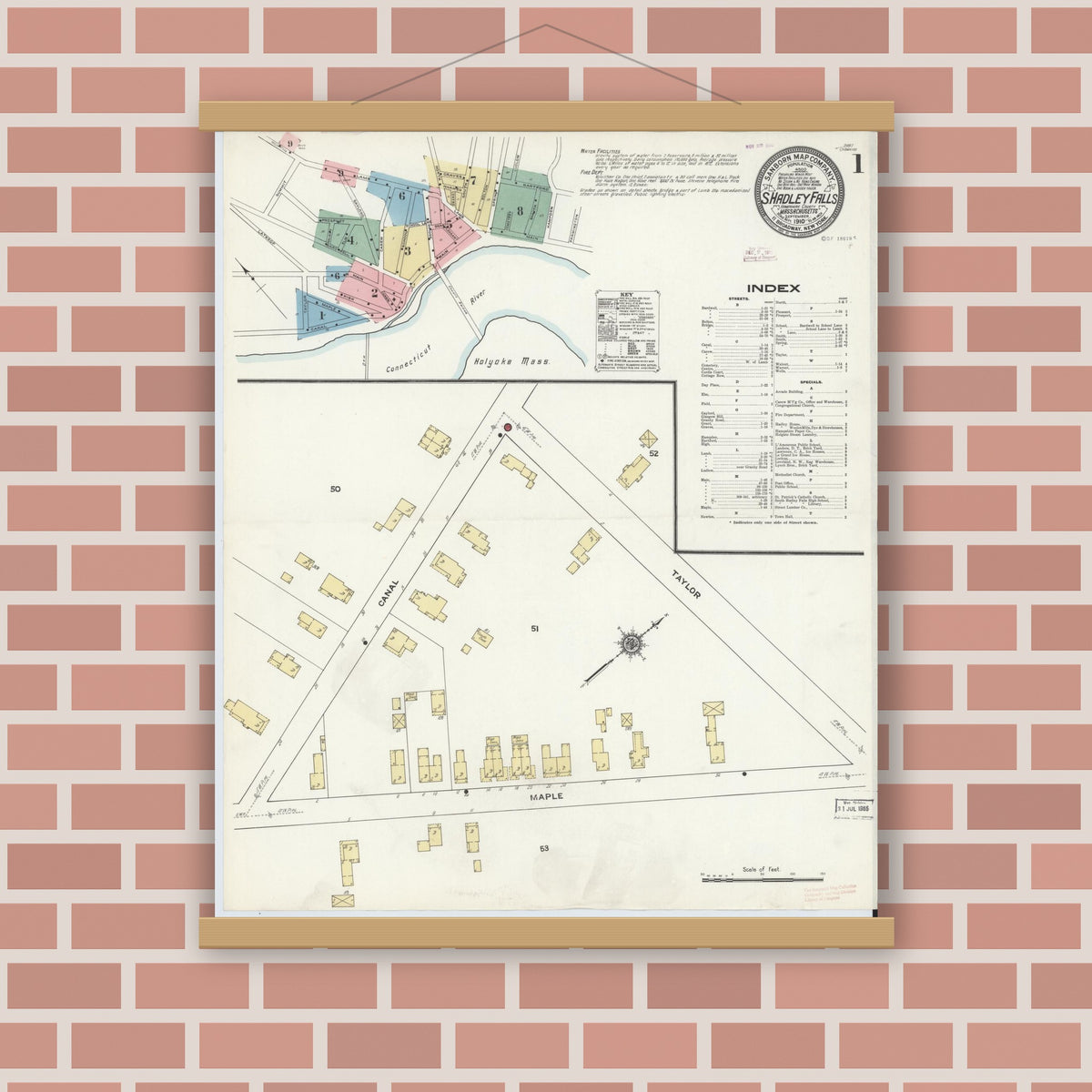Old map wall art mockup — magnetic wood frame on brick wall — Sanborn Fire Insurance Map from South Hadley Falls, Hampshire County, Massachusetts (1910), Sheet #0001