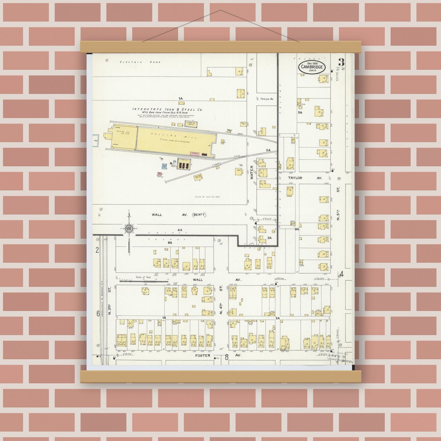 Old map wall art mockup — magnetic wood frame on brick wall — Sanborn Fire Insurance Map from Cambridge, Guernsey County, Ohio (1909), Sheet #0003