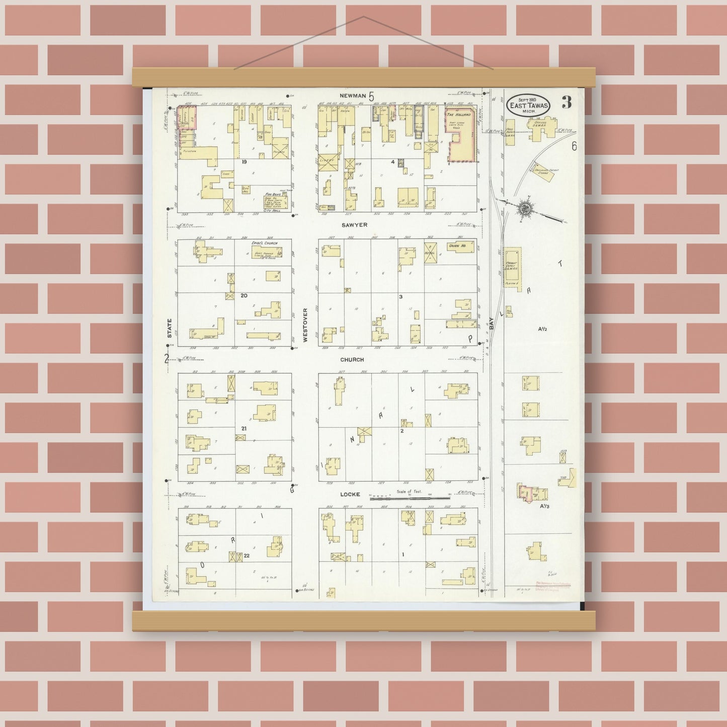 Old map wall art mockup — magnetic wood frame on brick wall — Sanborn Fire Insurance Map from East Tawas, Iosco County, Michigan (1910), Sheet #0003