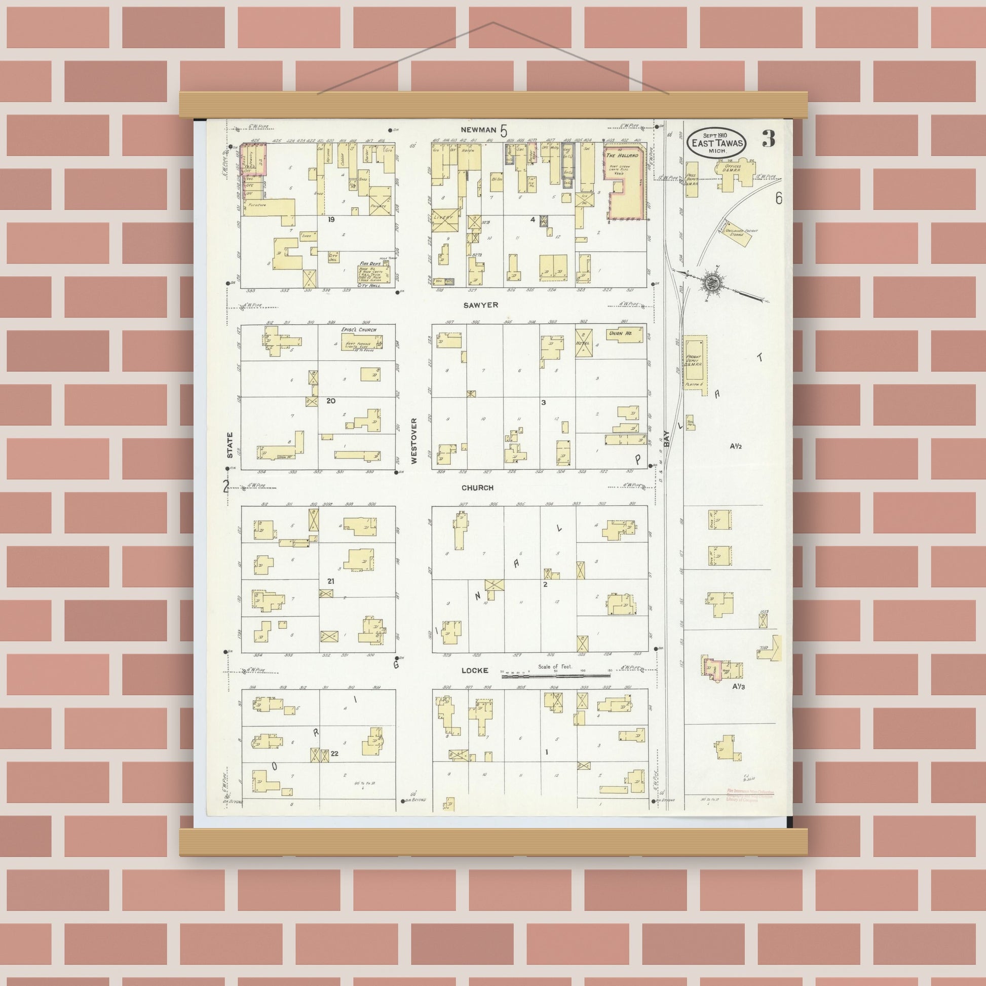 Old map wall art mockup — magnetic wood frame on brick wall — Sanborn Fire Insurance Map from East Tawas, Iosco County, Michigan (1910), Sheet #0003