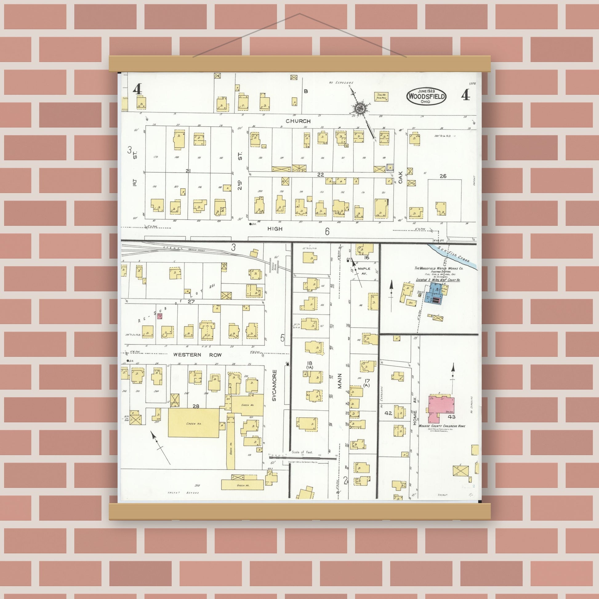 Old map wall art mockup — magnetic wood frame on brick wall — Sanborn Fire Insurance Map from Woodsfield, Monroe County, Ohio (1923), Sheet #0004